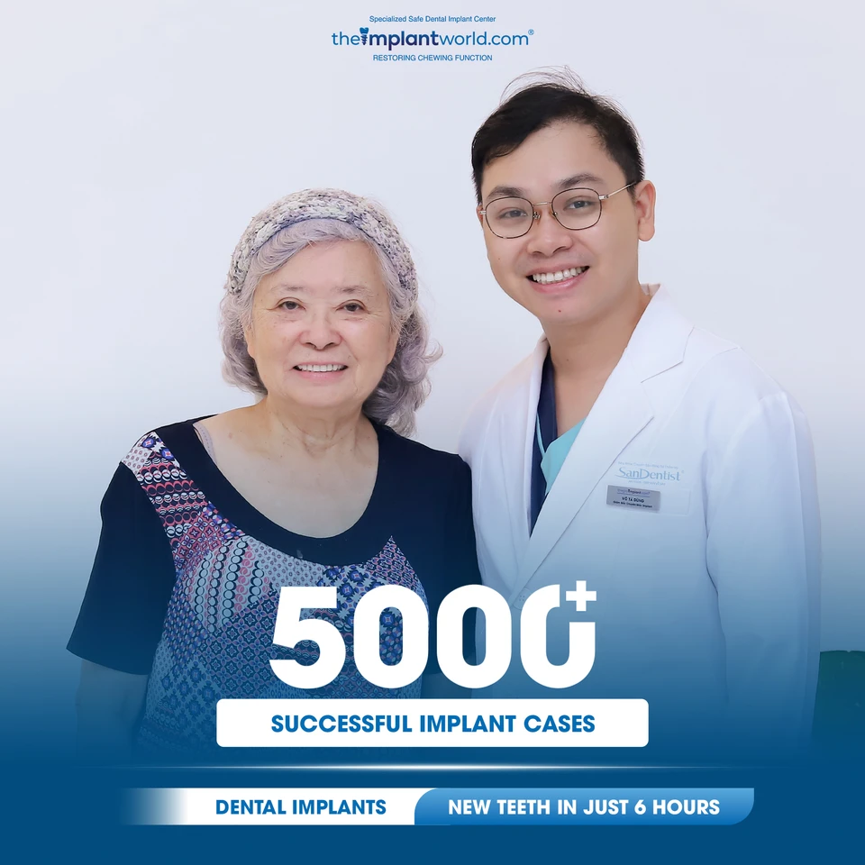 Dr. Vo Ta Dung and an elderly patient after a successful implant procedure at Theimplantworld.com